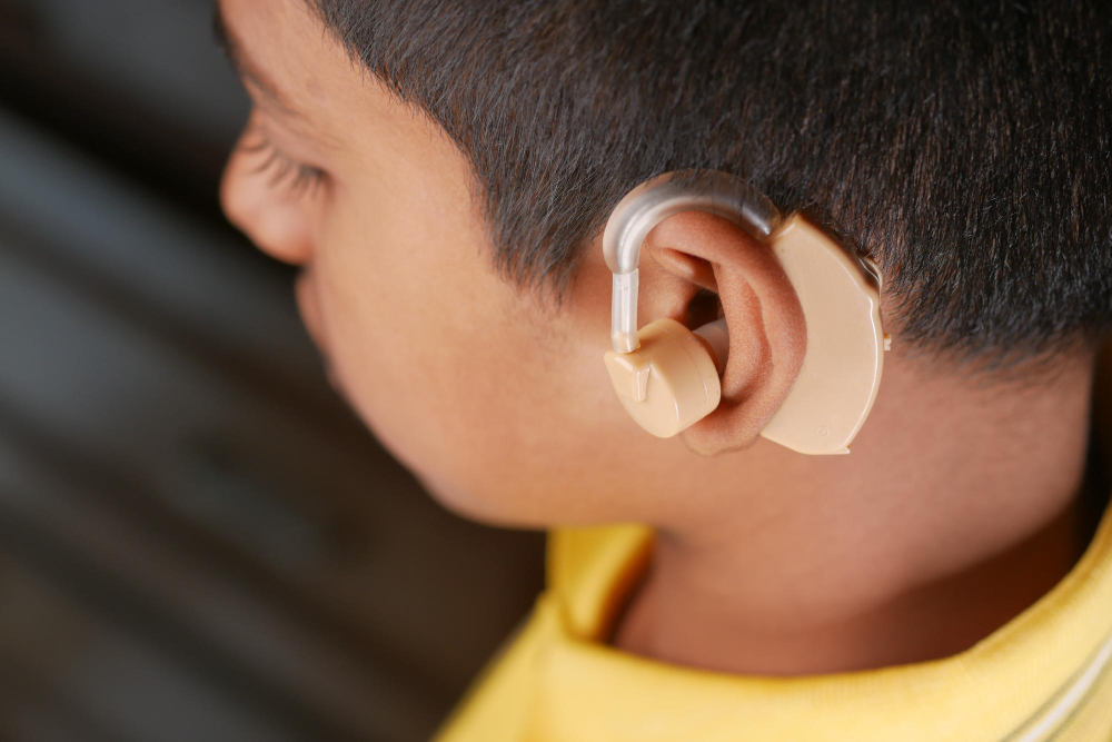 Hearing aid concept teenage boy with hearing problems